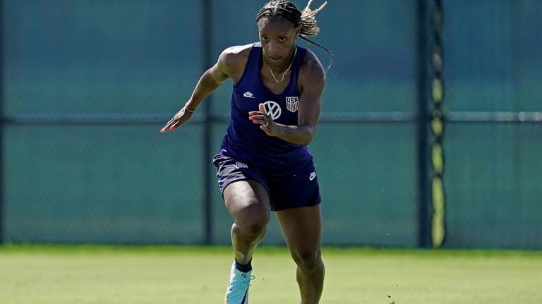 U.S. national team player Crystal Dunn takes part in a...