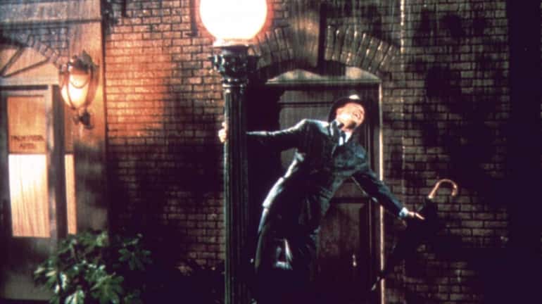 Gene Kelly does his iconic rain dance from the 1952...