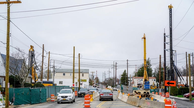 Construction seen Sunday at the Covert Avenue LIRR crossing in New...