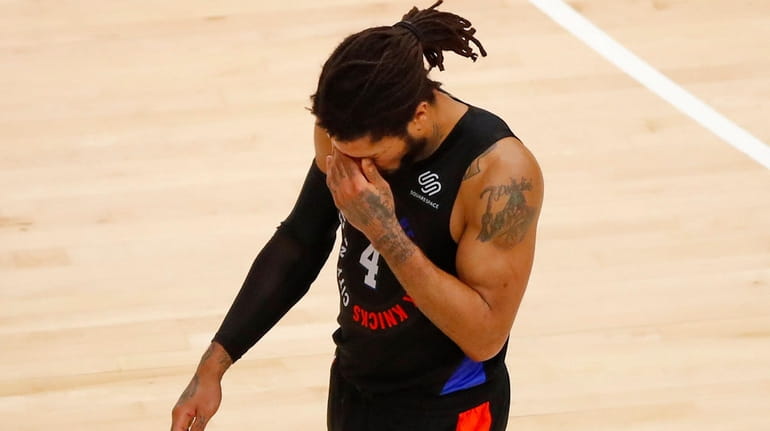 Derrick Rose of the New York Knicks reacts in the...