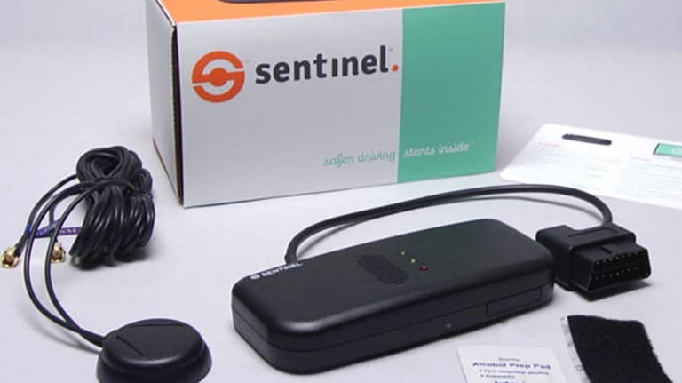 The Sentinel device reminds drivers to place their phones in...
