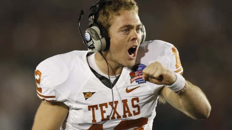 Texas quarterback Colt McCoy reacts to a two-point conversion against...