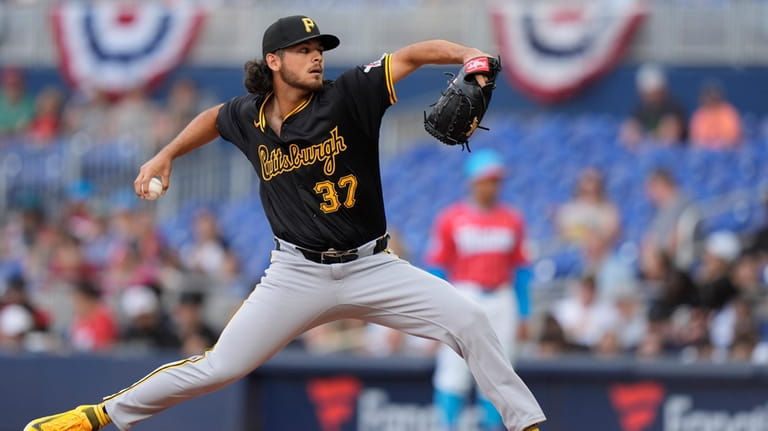 Pittsburgh Pirates' Jared Jones delivers a pitch during the first...