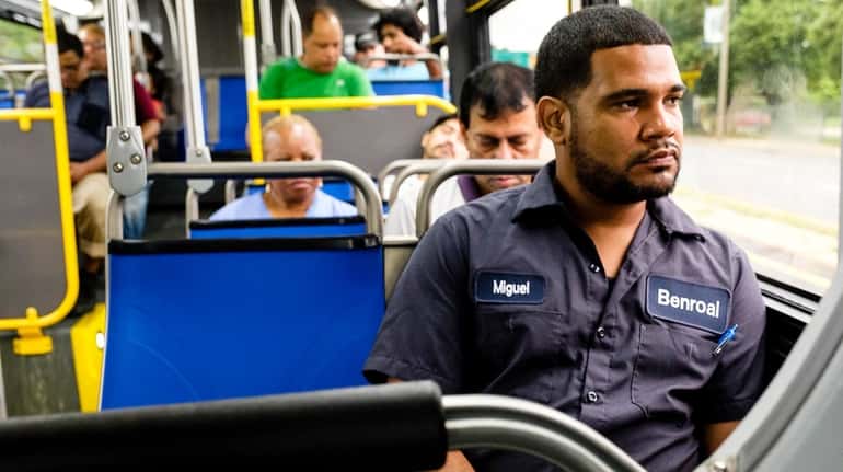Miguel Mane rides a bus from Jamaica to Hempstead about...
