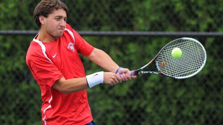 Josh Levine of Cold Spring Harbor returns a volley from...
