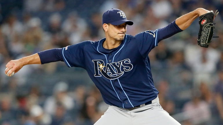 Charlie Morton of the Tampa Bay Rays pitches  against the Yankees in...