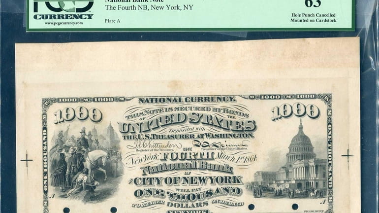 The proof of a rare $1,000 national bank note issued...