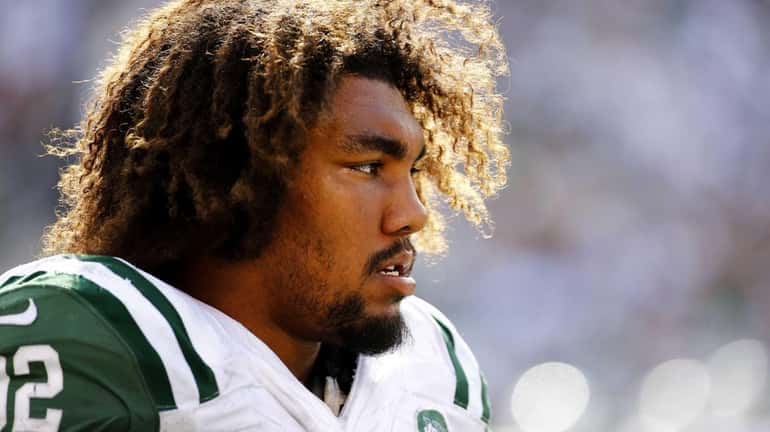 Leonard Williams of the New York Jets looks on in...