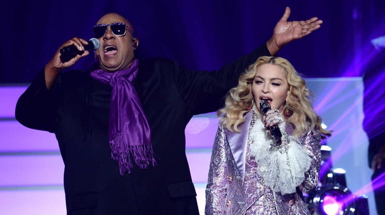 Recording artists Stevie Wonder and Madonna perform a tribute to...