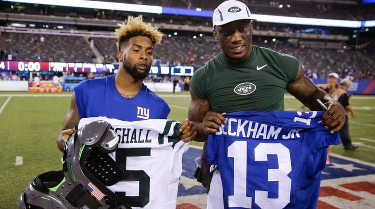Giants wide receiver Odell Beckham, left, and Jets wide receiver...