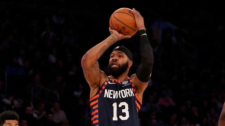 Marcus Morris Sr. #13 of the Knicks takes a shot...