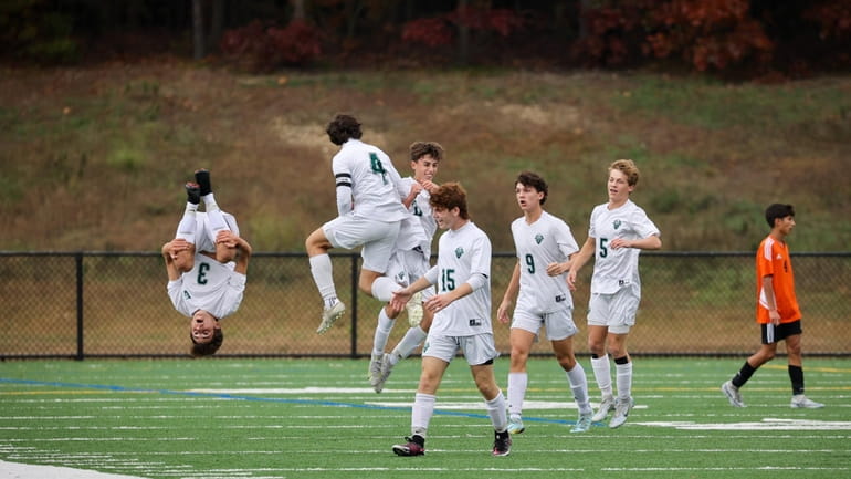 Carle Place celebrates their second goal against Babylon during the...