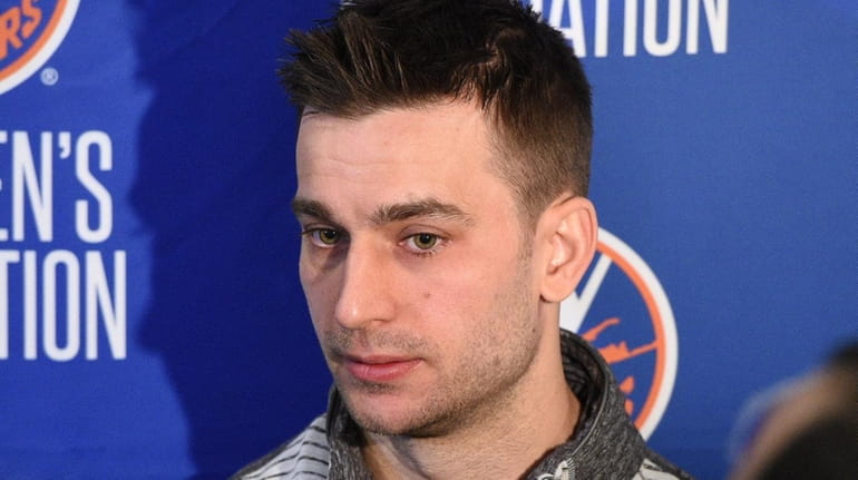 New York Islanders center Frans Nielsen speaks with the media...