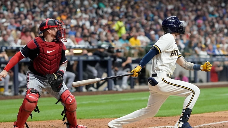 Milwaukee Brewers' Brice Turang hits an RBI single during the...