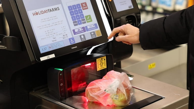 Self-checkout customers often require assistance with produce codes.