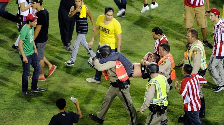 Brawls at a match between intense Mexican rivals Chivas and...