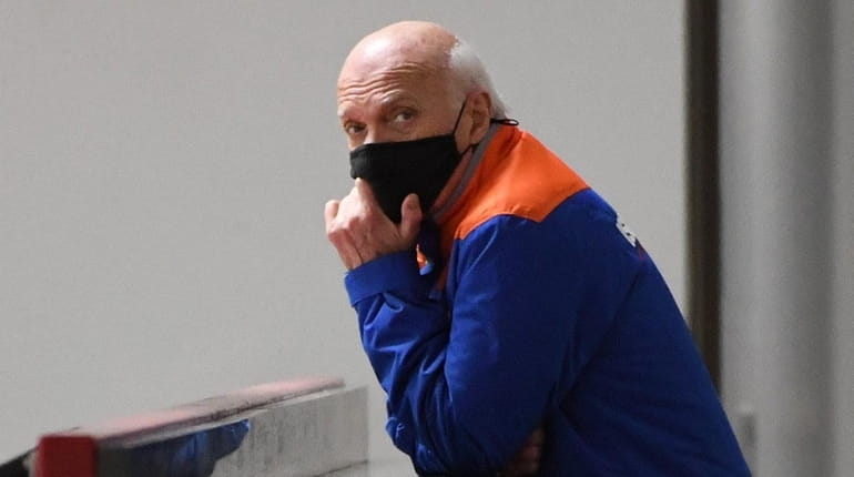 Islanders general manager Lou Lamoriello observes practice during training camp...