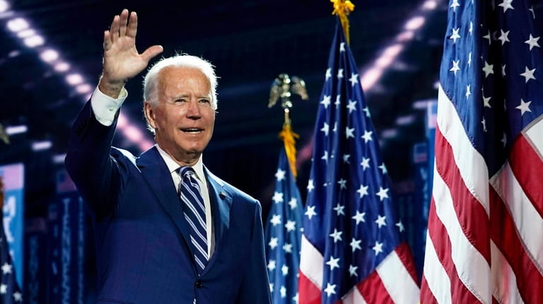 Democratic presidential candidate former Vice President Joe Biden stands on...