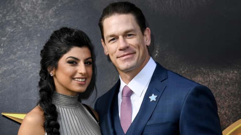 Shay Shariatzadeh and John Cena at the premiere of "Dolittle"...