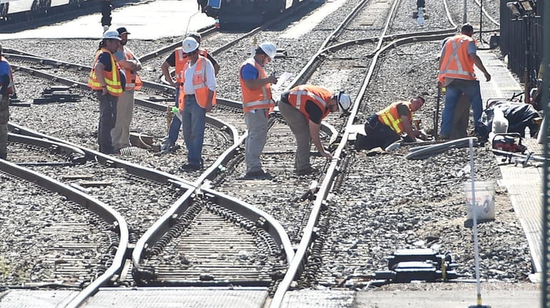 LIRR workers repair tracks near Speonk on May 26.