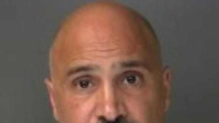 Robert L. Liguori, 51, of Mastic Beach, was charged with...