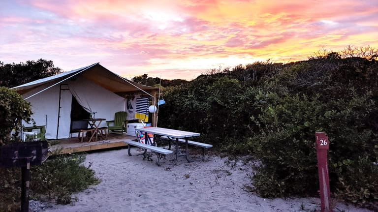 The campground at Watch Hill on Fire Island offers safari-style...