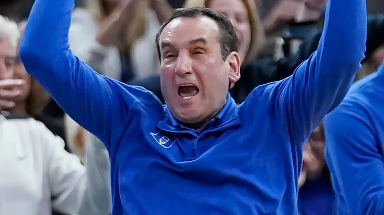 Duke head coach Mike Krzyzewski celebrates after his team defeated...