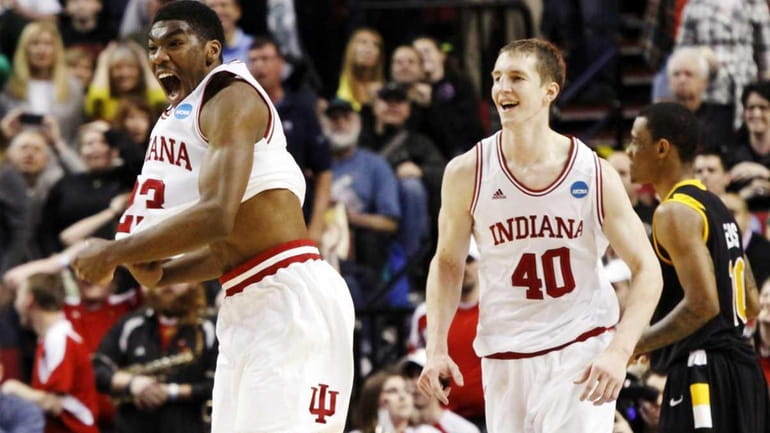 Indiana's Remy Abell, left, and Cody Zeller celebrate after defeating...