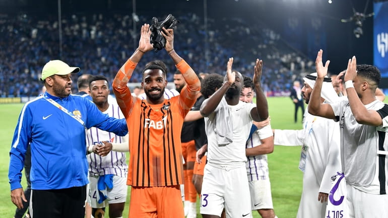 UAE's Al Ain' players celebrate after the second leg of...