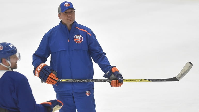 John Gruden, New York Islanders assistant coach, watches practice at...