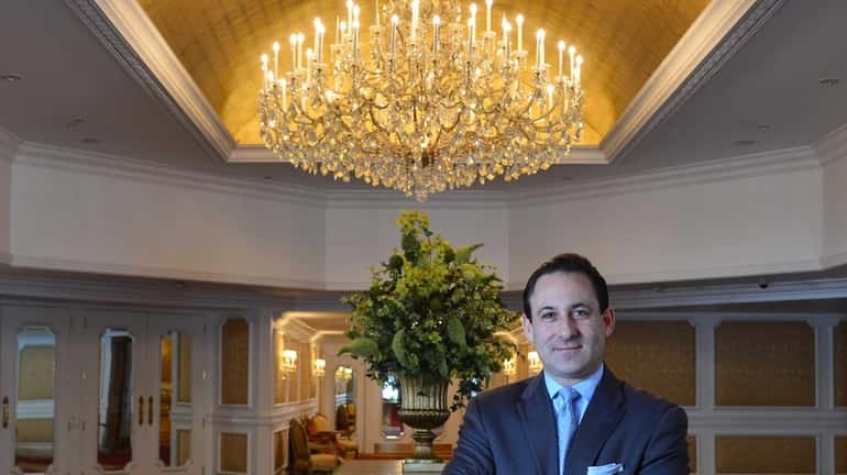 J. Grady Colin, general manager at The Garden City Hotel,...
