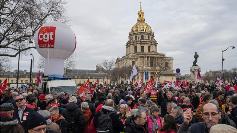 People stage a protest against the retirement bill in Paris...