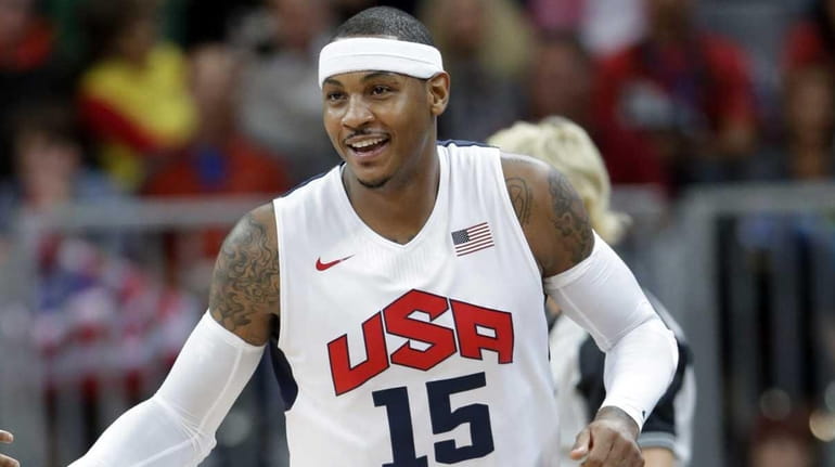 USA's Carmelo Anthony celebrates a score against Nigeria during a...