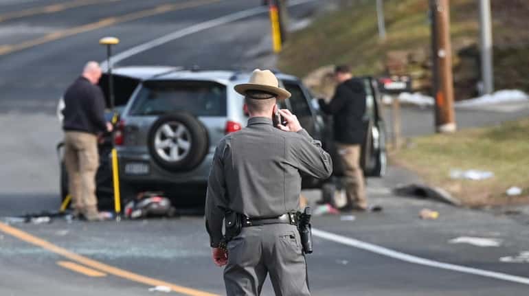State troopers at the scene in Flanders where a child...