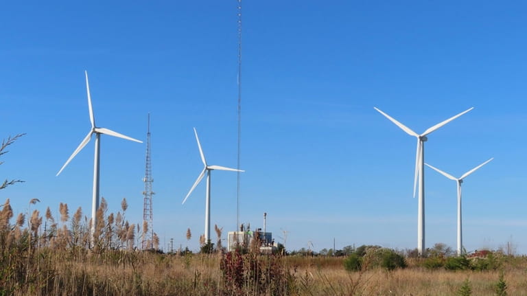 Land-based wind turbines spin in Atlantic City N.J. on Nov....