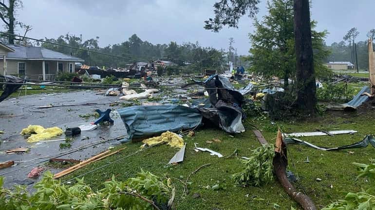 This photo provided by Alicia Jossey shows debris covering the...