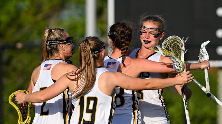 St. Anthony’s players celebrate the goal of Ava Biancardi during the CHSAA...