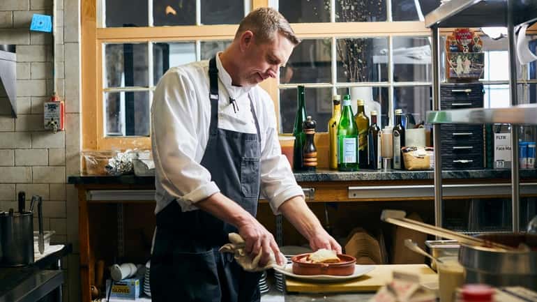 Chef-owner Stephen Gallagher in the kitchen of his St. James...