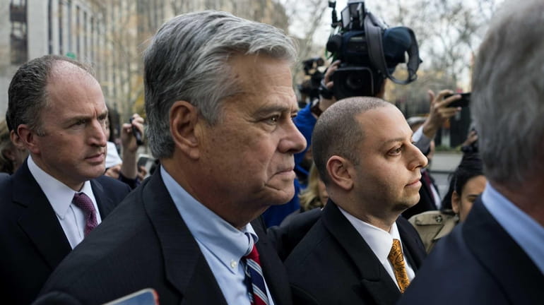 Dean and Adam Skelos outside Manhattan federal court after they...