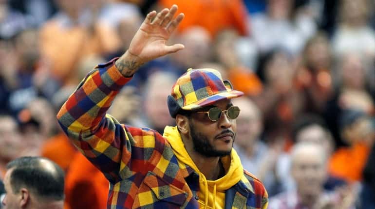 Carmelo Anthony waves to the crowd during the first half...