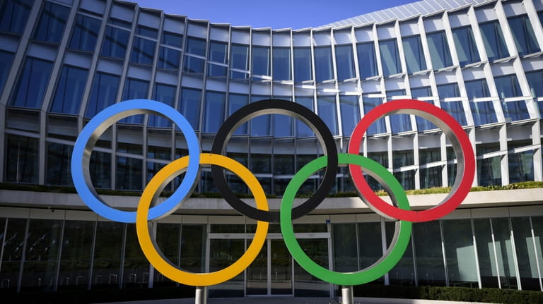 Olympic Rings are pictured in front of The Olympic House,...