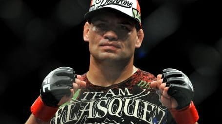 Heavyweight Cain Velasquez poses after his second-round TKO victory over...