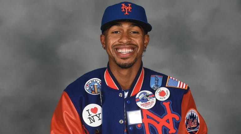 Francisco Lindor poses for a photo wearing a New York...