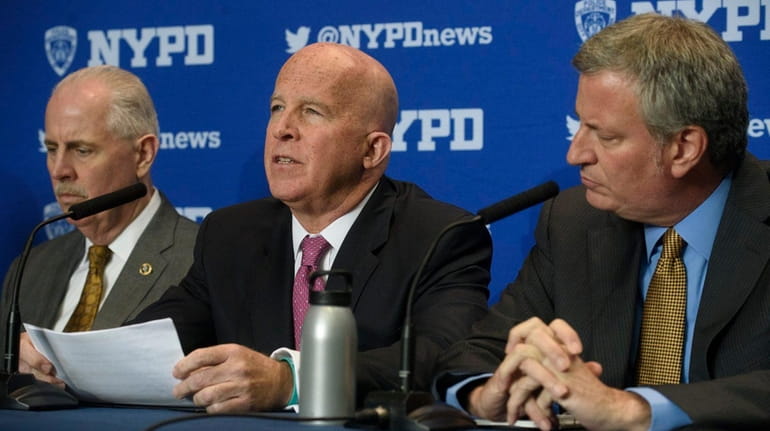 From left, NYPD Chief of Detectives Robert Boyce, NYPD Commissioner...