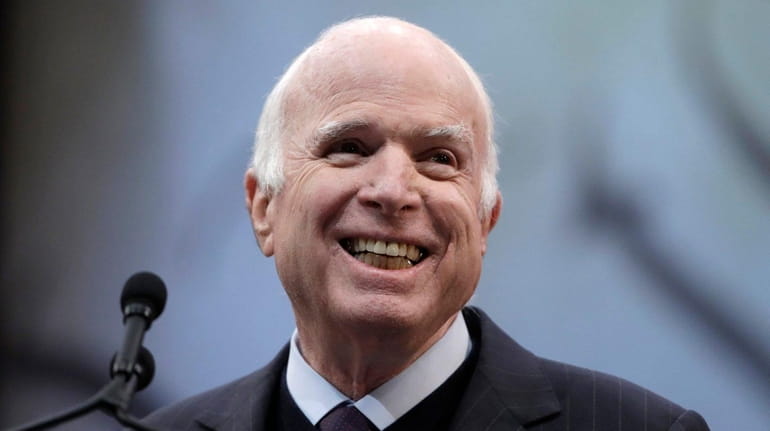 Sen. John McCain receives the Liberty Medal from the National...