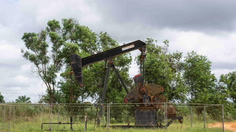 An oil drilling structure operates near the village of Kinkazi,...