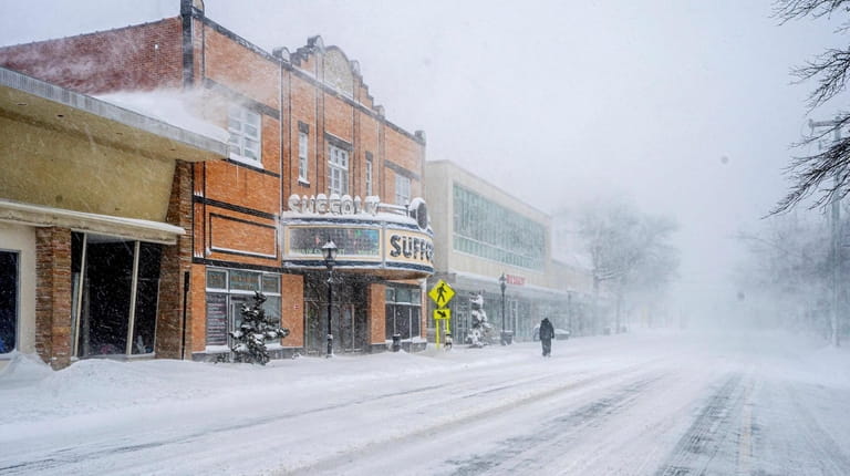 Main Street in Riverhead during a winter snowstorm on Saturday.