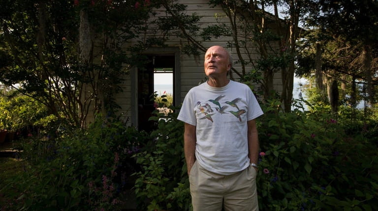 70-year-old Paul Adams at his hummingbird sanctuary in Baiting Hollow...