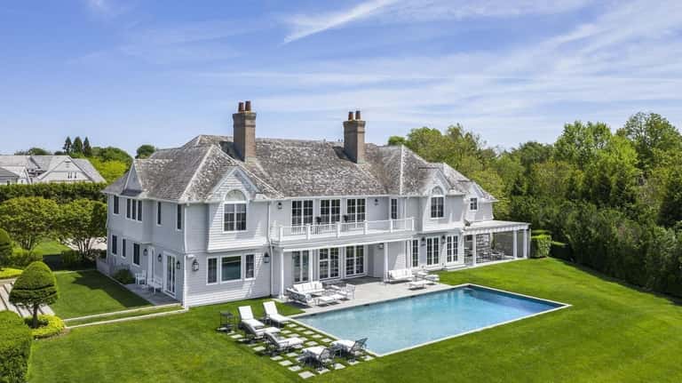 This 9,800-square-foot shingle-style, waterfront home in Southampton has seven bedrooms, 8½ baths,...