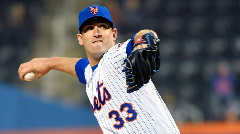Mets starting pitcher Matt Harvey pitches against the Phillies at...